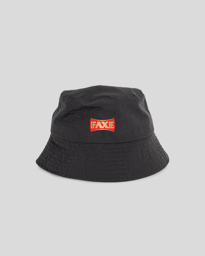 A black bucket hat with a red and white 'FAKE' logo patch on the front, photographed against a solid light gray background.